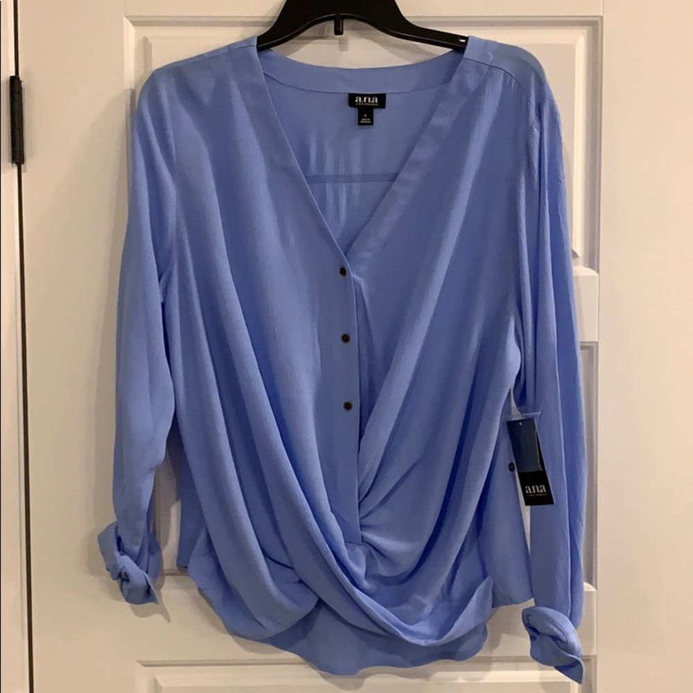 Women’s blue long sleeve shirt.